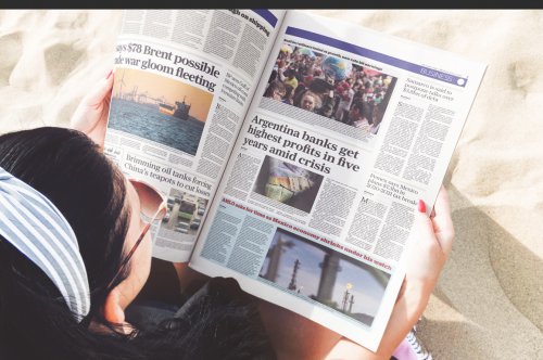 Girl Reading Newspaper Scene Mockup