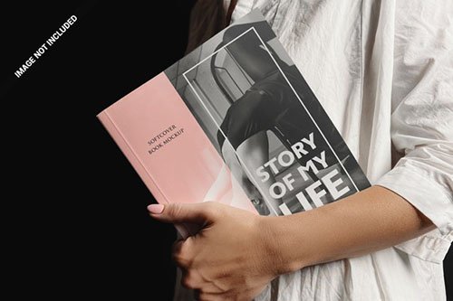 Woman presenting a book mockup